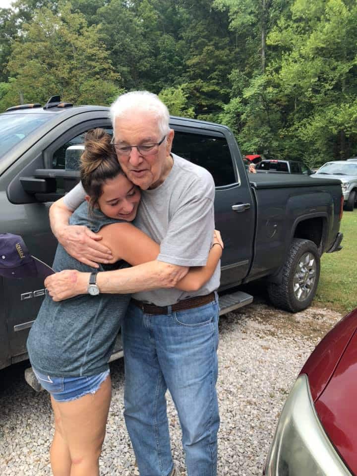 Grampa and Grand daughter embrace